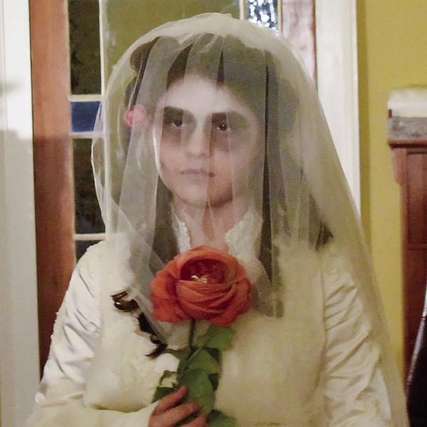 Sylvia, the famed ghost of Panola Hall, greets visitors during Haunted Eatonton. HANNAH BARRON/Staff