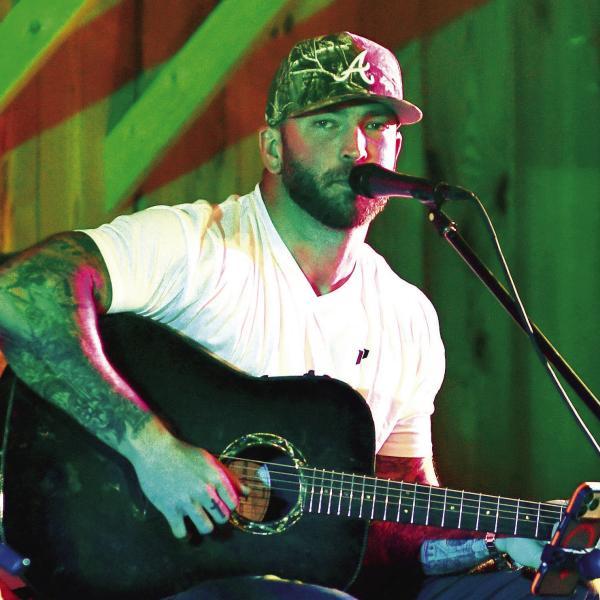 Songwriter Josh Phillips said he truly enjoyed his visit to Lake Country and thanked his “500 or so friends” who attended “Songwriters Night” at Briarpatch Farm. SKYLA MORRIS/Staff