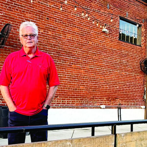 Ken McCord in front of the former Oconee Brewing Company, now being launched as Barrel & Rail. MAUREEN STRATTON/Staff