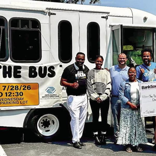 BankSouth representatives contributed a $1,000 donation to the Pete Nance Boys &amp; Girls Club’s recent “Stuff the Bus” campaign. CONTRIBUTED