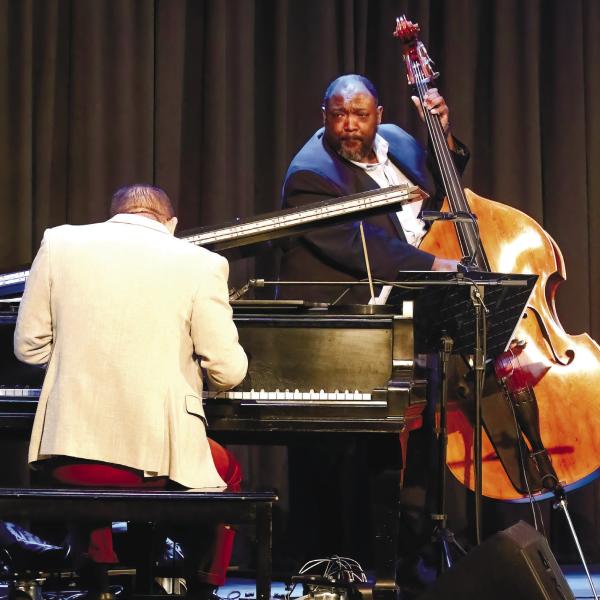 Nick Rosen on the piano and Kevin Smith on bass hit the right notes.