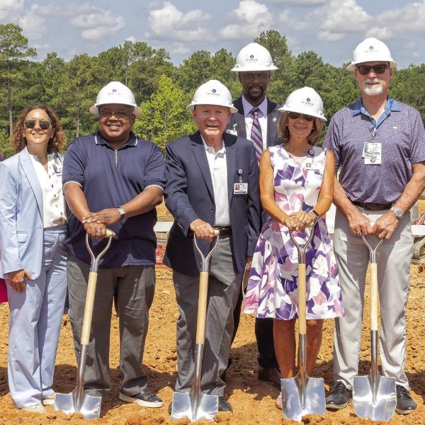 St. Mary’s and community leaders pose for a photo to celebrate breaking ground for St. Mary’s Good Samaritan Pavilion. LEIGH LOFGREN/Staff