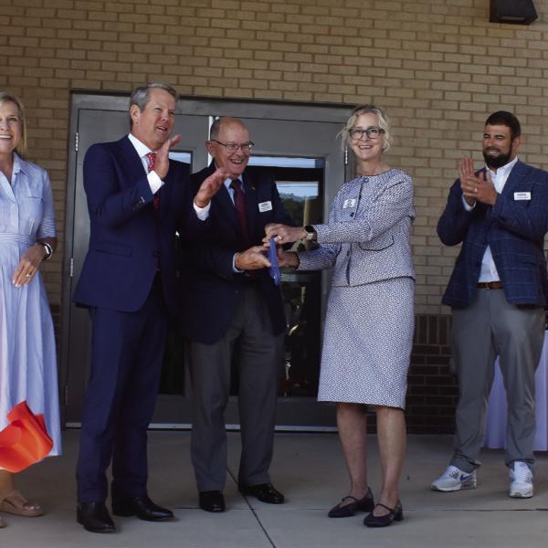 The Georgia Department of Veterans Service hosted a ribbon cutting, with keynote speaker Gov. Brian Kemp (third from left) and his wife, Georgia First Lady Marty Kemp (second form left), to celebrate the opening of the Transitional Support Unit. BAILEY BALLARD/Staff