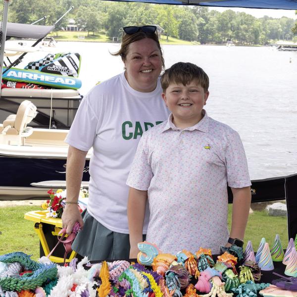 Connor and his mother, Kaya Edge. Connor designs makes and prints 3D designs for sale. LEIGH LOFGREN/Staff