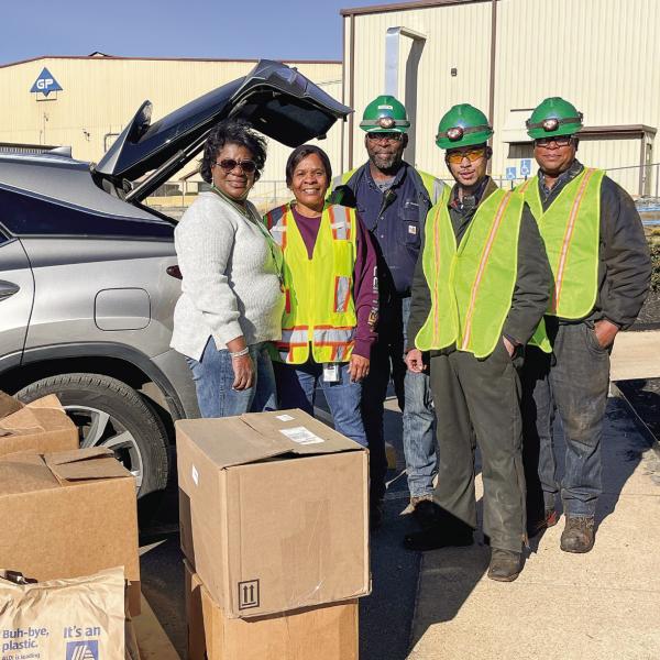 Sherry Terrell, director of the Madison-Morgan Community Food Pantry, with Georgia-Pacific employees Jackie Dillon, Donald Davis, KeMonta Heath, and Dock Veasley. CONTRIBUTED