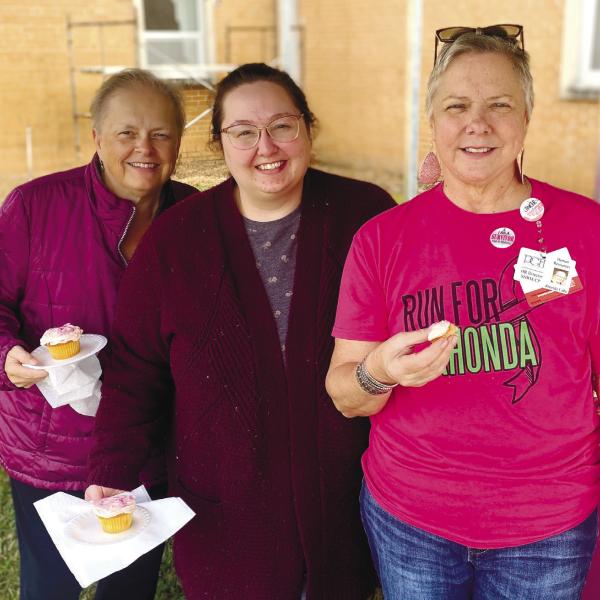 Susan Hobbs and Caitlin Sims, pose with cancer survivor Rhonda Cabe. CONTRIBUTED