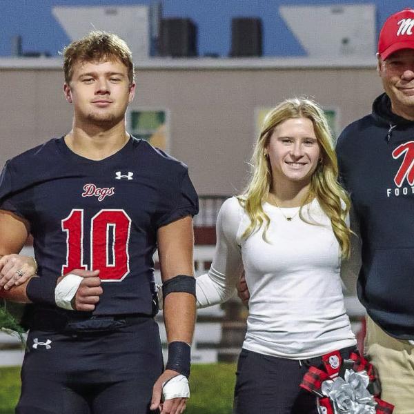 The Jenkins family poses for a photo on Morgan County football’s Senior Night last season. CONTRIBUTED