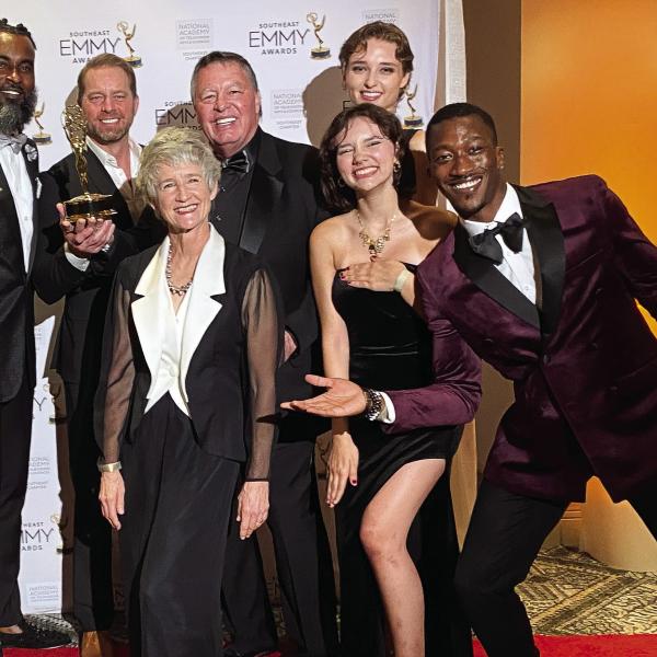 The Tytan crew, including (back, l-r) Nathan Ross, Drew Waters, Jim Stone, and Katie Hopwood, with (front, l-r) Roxy Stone, Addie Brown, and Darnell Jordan at the Southeast Emmy Awards on June 14, at the Hyatt Buckhead in Atlanta. IAN TOCHER/Staff