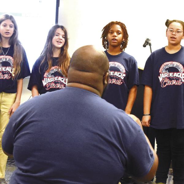 Chorus teacher Ontario Williams leads sixth grade chorus members in singing ‘Color of the Wind’ from the Disney movie Pocahontas. BAILEY BALLARD/Staff