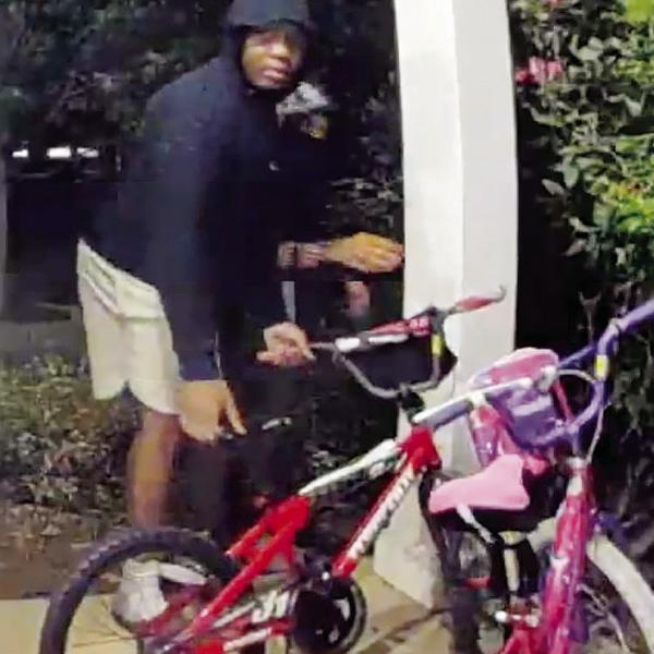 A doorbell camera caught these two thieves making off with a bicycle. CONTRIBUTED