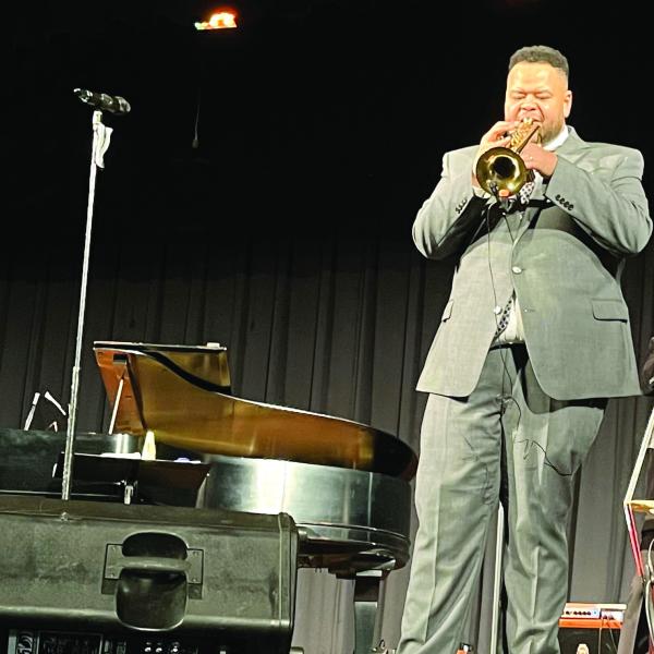 Jumaane Smith performed for the semi-annual Neighbors Helping Neighbors membership meeting in November. CONTRIBUTED