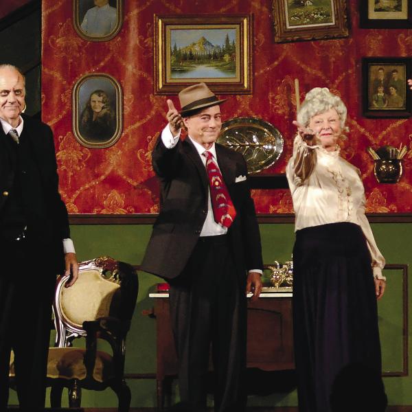 Actors (l-r) Michael Alexander, Arthur Shutt, Michael Homeier, Debbie McCown, Rusty Faulk and Drace Langford salute the crowd after presenting “Arsenic and Old Lace” Nov. 5 at Festival Hall in Greensboro.