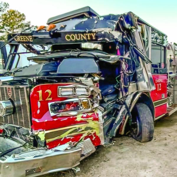 A Greene County Fire Department truck sustained heavy damage in a single-vehicle accident on New Year’s Eve, sending its driver and passenger to two area hospitals for treatment of their injuries. CONTRIBUTED