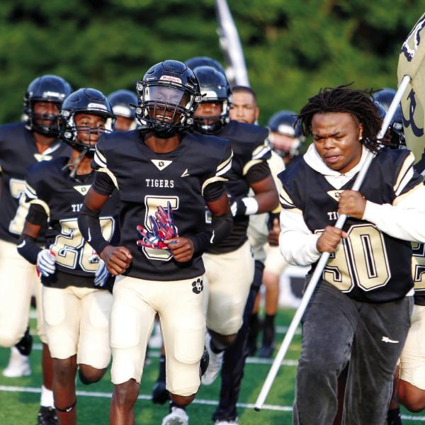 The Tigers take the field before their scrimmage against Northeast of Macon on Aug. 8, 2025. LANCE McCURLEY/Staff