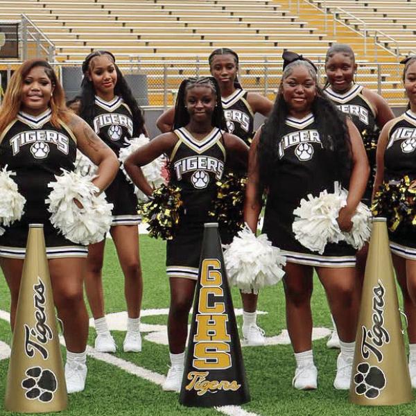 The Greene County cheerleading squad is preparing to take the next step into competitive cheer under head coach Aleah Callaway (far right). CONTRIBUTED