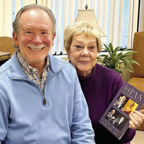 Incoming Oconee Performing Arts Society Board Chair Barry Selvidge shares a piano bench with outgoing chair Margie Eddy-Forbes. CONTRIBUTED