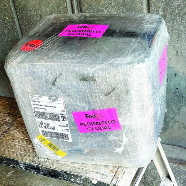 This grounddelivery service package at Mario Munoz’s house contained 25 pounds of meth. CONTRIBUTED/ PCSO