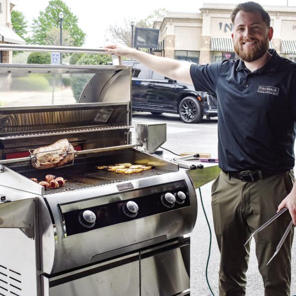 Stephen Montgomery of Fire Magic Premium Grills cooked brats, burgers, grilled fruit, pizza and more to show off one of the company’s grills. CONTRIBUTED