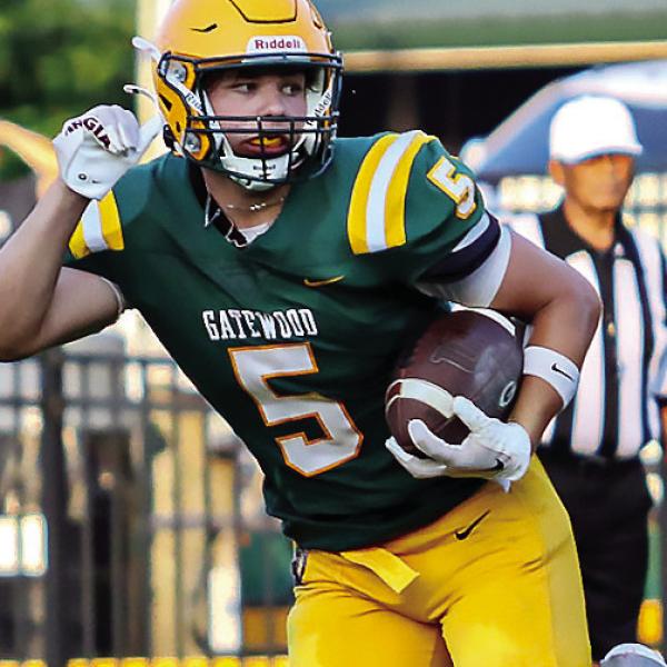 Gatewood running back Brady Haley runs downfield behind his blockers during a preseason scrimmage July 31. TREY NORRIS/Staff