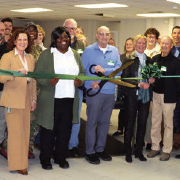 GCFP Chairman Steve Ruzika cuts the ribbon to celebrate the new facility, alongside friends, employees, and volunteers. CONTRIBUTED