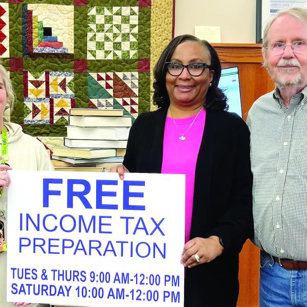 L-R: Greene County Library Branch Manager Tara Coile, Greene County Library Executive Director Targie Folds, and St. Vincent de Paul Vice President Mike Sleeth. CONTRIBUTED