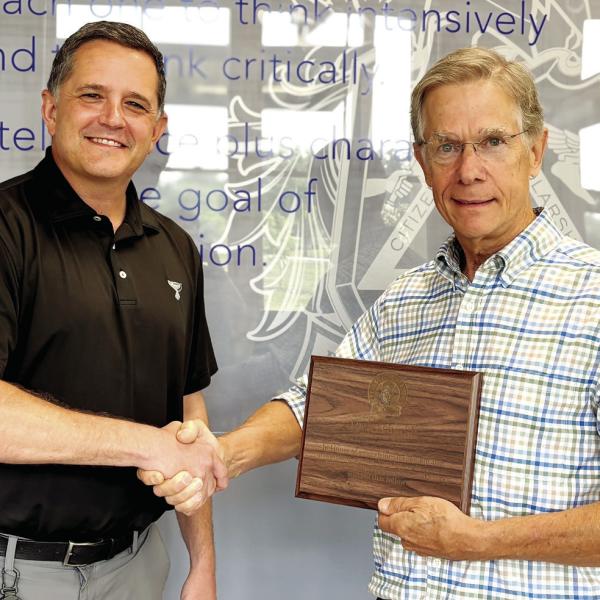 Founding board member Dick Schmidt (right) was recognized by Lake Oconee Academy June 2. Schmidt will step away from the board after serving since 2006. HANNAH BARRON/Staff