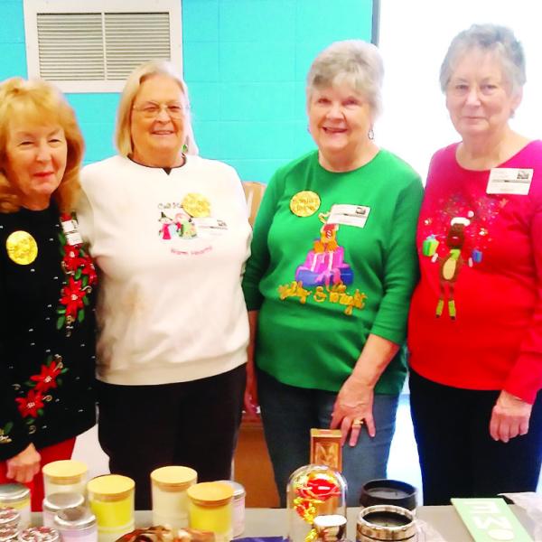L-R: Judy Fain, Linda Pressley, Gail Mills and Leonell Alligood work as Santa’s helpers at Santa’s Secret Workshop. CONTRIBUTED