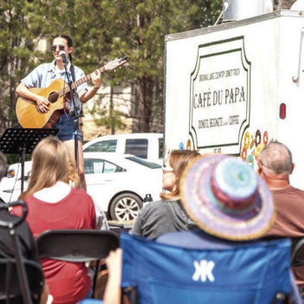 A live music stage with a DJ playing tunes between sets kept the crowd entertained last spring at The Big Event’s first appearance at Lake Oconee Church in Greensboro, where it returns on March 21 this year. CONTRIBUTED