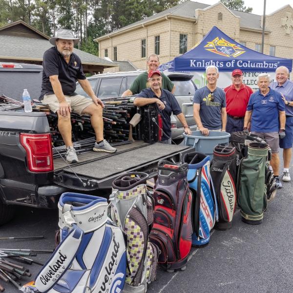 Jerry Stapp, Ernie Ceccato, Greg Haas, Paul Nickel, Chris Wolf, Ed Zaucha and Jerry Nicholson with some of the golf equipment going to Bunkers in Baghdad. LEIGH LOFGREN/Staff