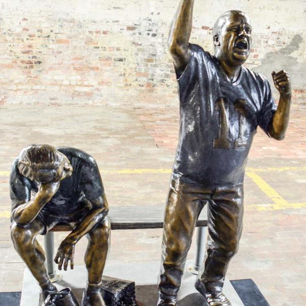 The thrill of victory versus the agony of defeat is captured by "Da Fans" by South Dakota artists Lee Lanning and Sherri Treeby. (IAN TOCHER/Staff)
