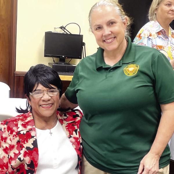 Helen Nelson and Lt. Tracey Pitoccheli reminisce how they became friends many years before Pitoccheli became a deputy and worked for PCSO. LYNN HOBBS/Staff