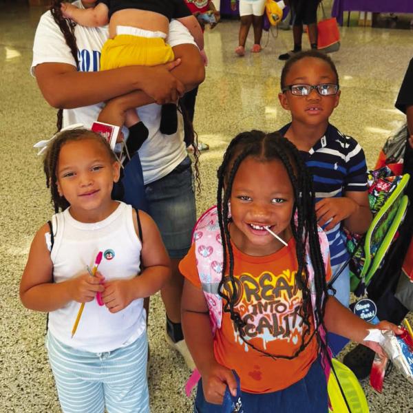 Happy families enjoyed the Reach 2 Teach Back-to-School Bash and Community Health Fair, held last Saturday at Putnam County Elementary School. CONTRIBUTED