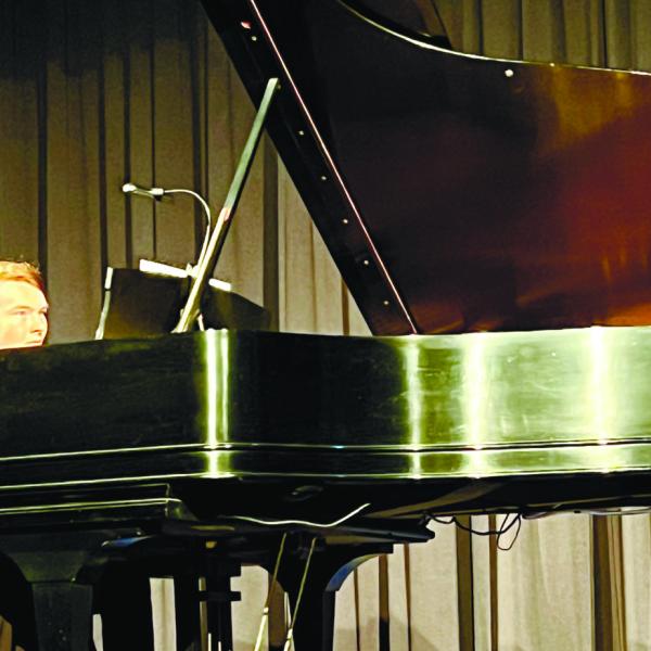 Festival Hall unveiled its new Steinway piano during a Piano and Art Celebration July 19. CONTRIBUTED