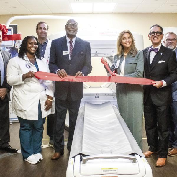 Morgan Medical Center staff, GE Health representatives, and local leaders cut the ceremonial ribbon to celebrate the facility’s milestone in nuclear medicine technology. SKYLA MORRIS/Staff