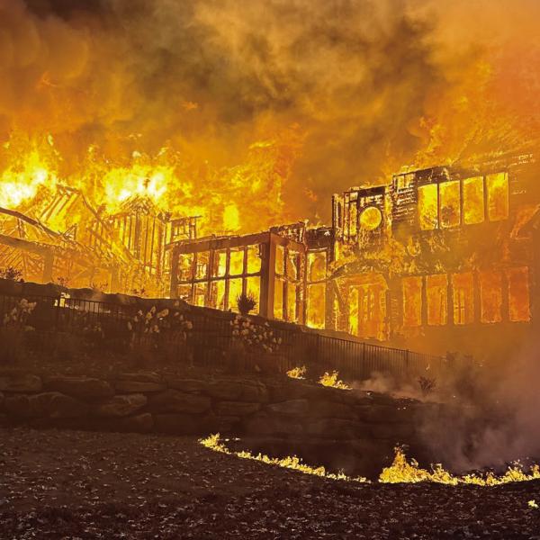This photo taken from behind a 9,000 square foot home in Reynolds Lake Oconee captures the power of the blaze that destroyed most of the home. CONTRIBUTED