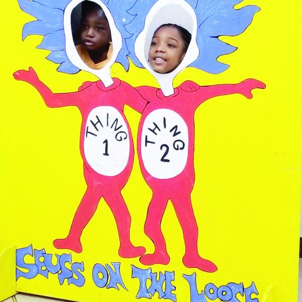 Two students pose as Thing 1 and Thing 2 during a previous Seuss on the Loose. CONTRIBUTED