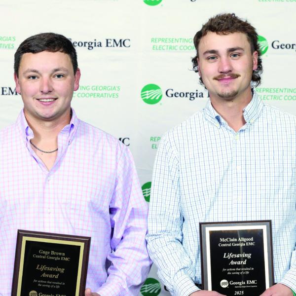 Gage Brown (left) and McClain Allgood (right) of Central Georgia EMC (CGEMC) received Lifesaving Awards from Georgia EMC during the state association’s annual meeting this year in Savannah. CGEMC serves more 66,000 billed accounts in 16 counties, including Putnam County. CONTRIBUTED