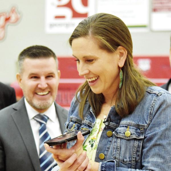 Morgan County High School’s Rachel Kinsaul calls her mom and husband to celebrate after winning the $25,000 Milken Educator Award. HANNAH BARRON/Staff