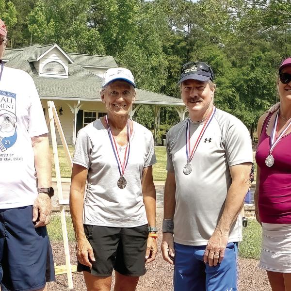 Medal winners (l-r) Sue Hagen, Walter Straus, Lisa Soeters, Billy Adams, and Linda and John Fitzpatrick. (LEIGH LOFGREN/Staff)