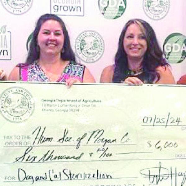 The Humane Society of Morgan County recently received a $6,000 grant on behalf of the Georgia Department of Agriculture’s Dog and Cat Sterilization Program. Pictured at the grant presentation are (L-R) Chelsea Turner, grant administrator; Miranda Johnson, director of operations for the Humane Society; Crystal Howard, programs manager for the Humane Society; and Jason Smith, Department of Agriculture representative. CONTRIBUTED