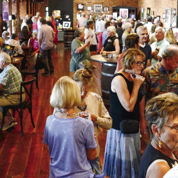Last year’s Dual Vision: Art Through Different Eyes show attracted a huge crowd to downtown Eatonton’s Barrel 118 event center and a similar turnout is expected. IAN TOCHER/Staff
