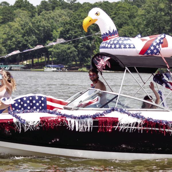 Event participants have gotten really creative over the years with their Fourth of July boat decorations. Scan the QR code above for the starting location. T. MICHAEL STONE/Staff