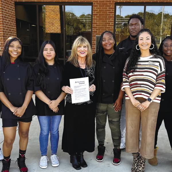 Culinary pathway students, Instructor Felicia Hodges, CTAE Director Mariana Mansfield, and representatives of the Thillen Education Foundation Leslie Clark and Dave Thillen pose together. CONTRIBUTED