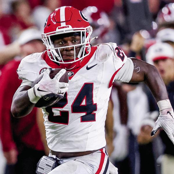 Bo Walker (24) also picked up snaps for a banged up running back room, carrying the ball 10 times for 69 yards. COURTESY OF UGA ATHLETICS