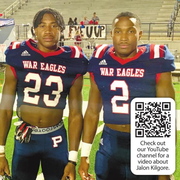 Jalon Kilgore (23) and Gerald Kilgore (2) pose for a photo after a game together. CONTRIBUTED