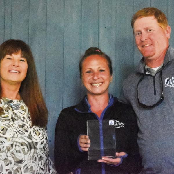 Jeff and Alanna Davis, owners of Window Wizardz, receive the Heartbeat Award. HANNAH BARRON/Staff