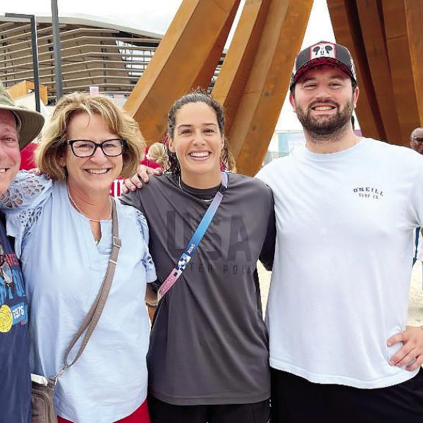 Sylvia’s Coffee owners Michael and Diana Homeier and their son, Gabriel, attended the Paris Olympics earlier this summer. Michael and Diana’s niece, Rachel Fattal (center), was playing on Team USA’s water polo team. (CONTRIBUTED)