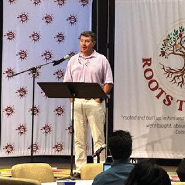 State Rep. Trey Rhodes shares legislative updates with attendees of the Greene County Well-Being of Children Summit. CONTRIBUTED
