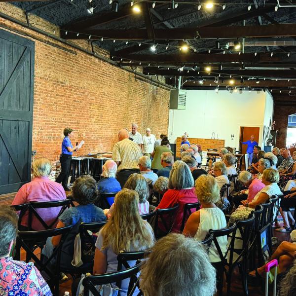 Artists and photographers gather at Barrel 118 in Eatonton Sept. 11 for the Big Reveal of the 10th annual Dual Vision: Art Through Different Eyes exhibition.