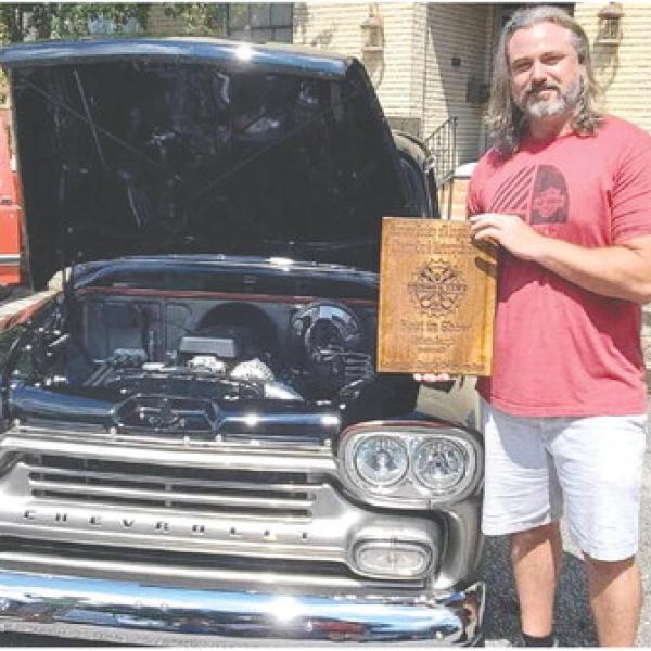 Ken Bishop of Rutledge beside his immaculate 1959 Chevy Apache pickup which won the coveted Best in Show award. T. MICHAEL STONE/Staff